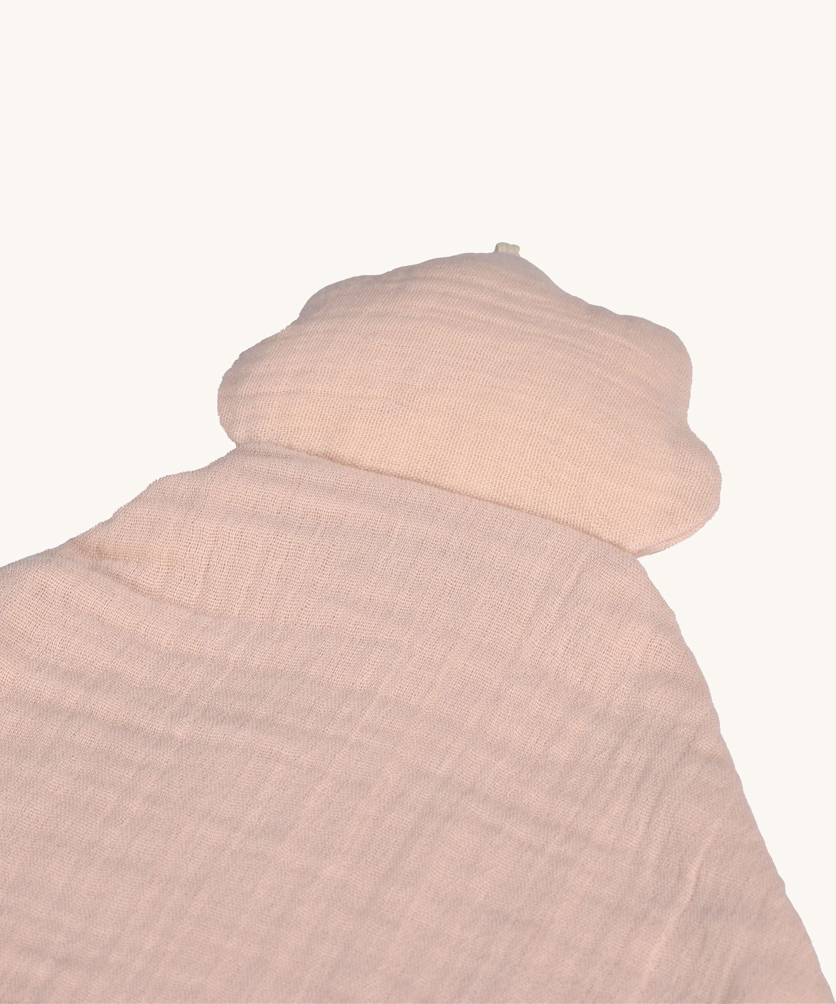 A closeup of the pink cloud attached to the Lassig organic cotton baby comforter. 