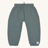 The Lassig organic muslin baby pants in petrol green. 