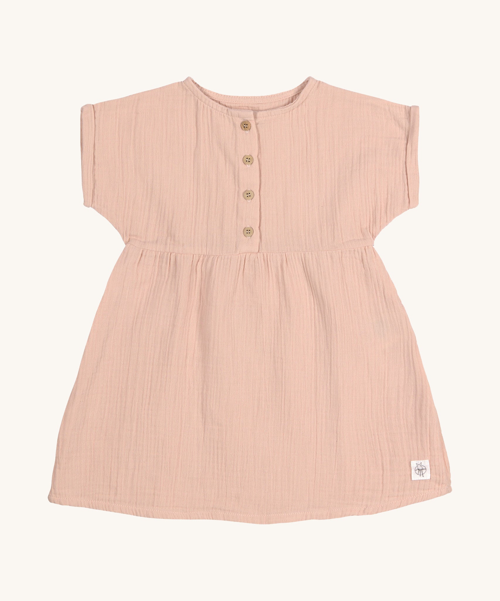 The Lassig organic cotton muslin dress for babies and toddlers in a pretty powder pink colour.
