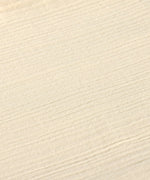 A closeup of the organic cotton muslin material used to make the Lassig bandana dribble bib. 