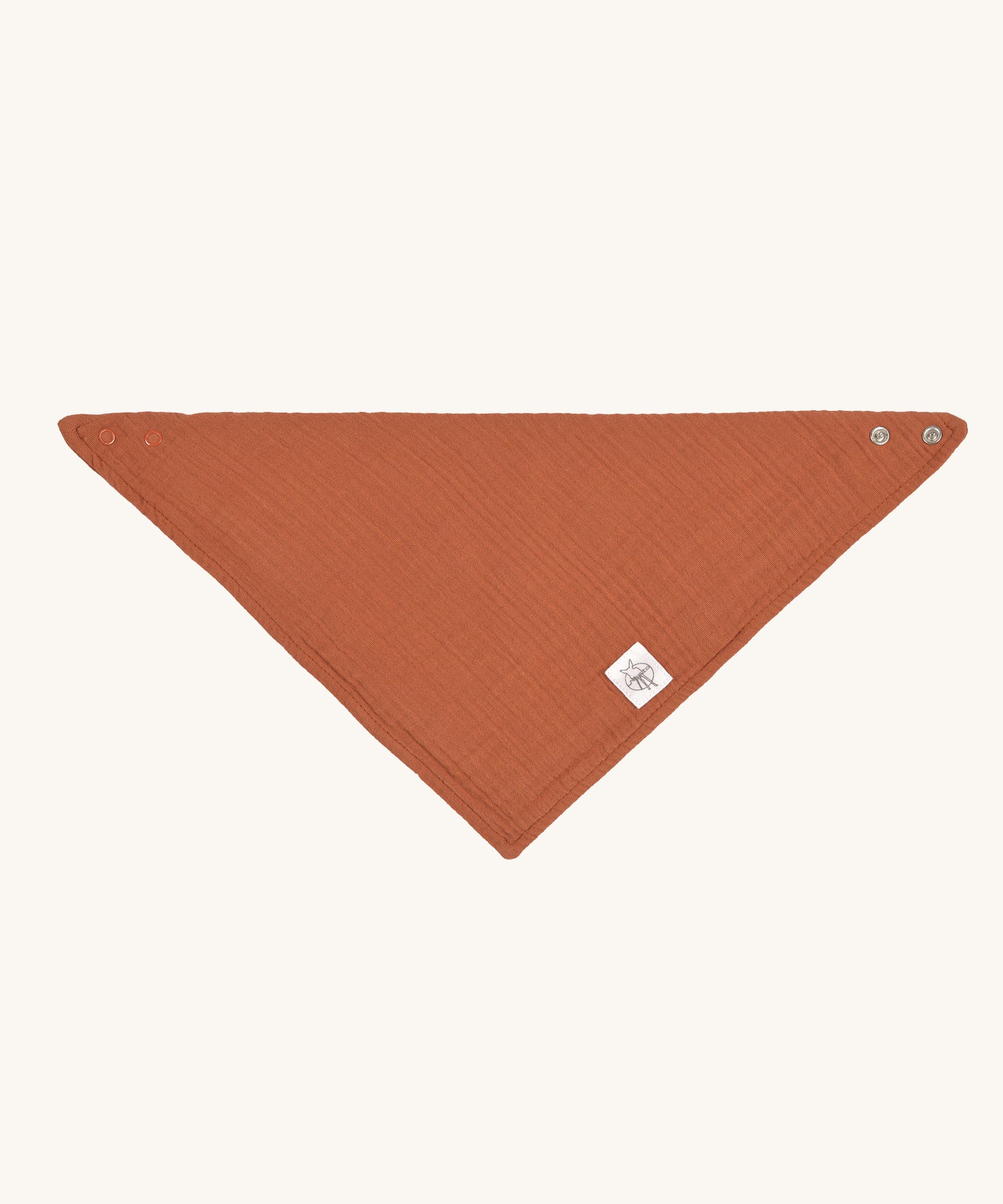 The Lassig organic cotton muslin bandana dribble bib in a lovely orange rust colour