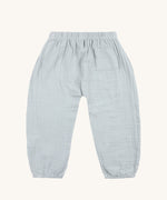 The back of the Lassig organic cotton muslin baby trousers, in powder blue. 