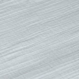 A closeup of the lovely organic cotton muslin fabric, in powder blue. 