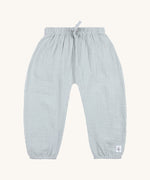 The Lassig organic cotton muslin baby and toddler trousers, in a light powder blue colour. 