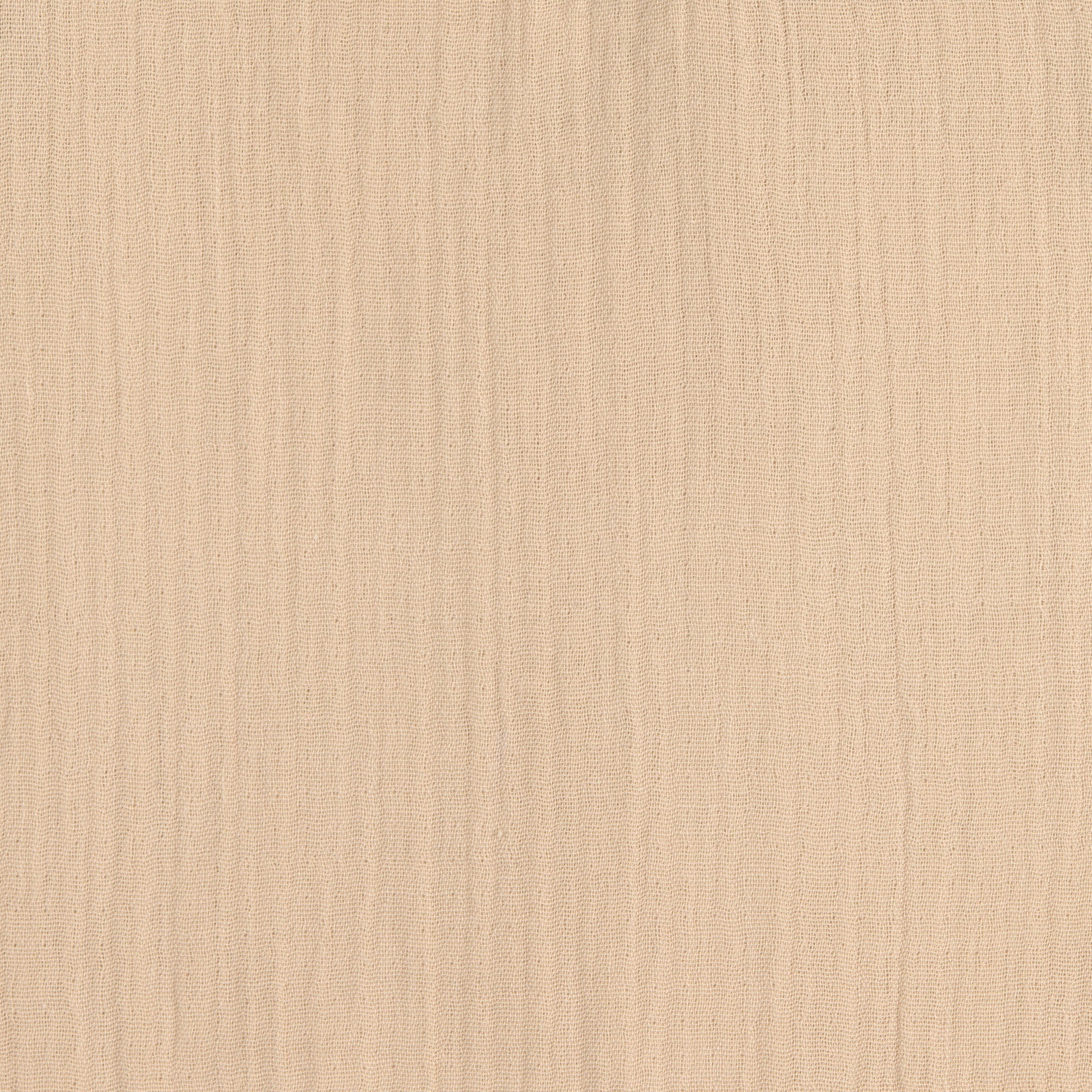 A closeup of the soft and luxurious organic cotton muslin fabric used to make the Lassig baby and toddler jumpsuit. 