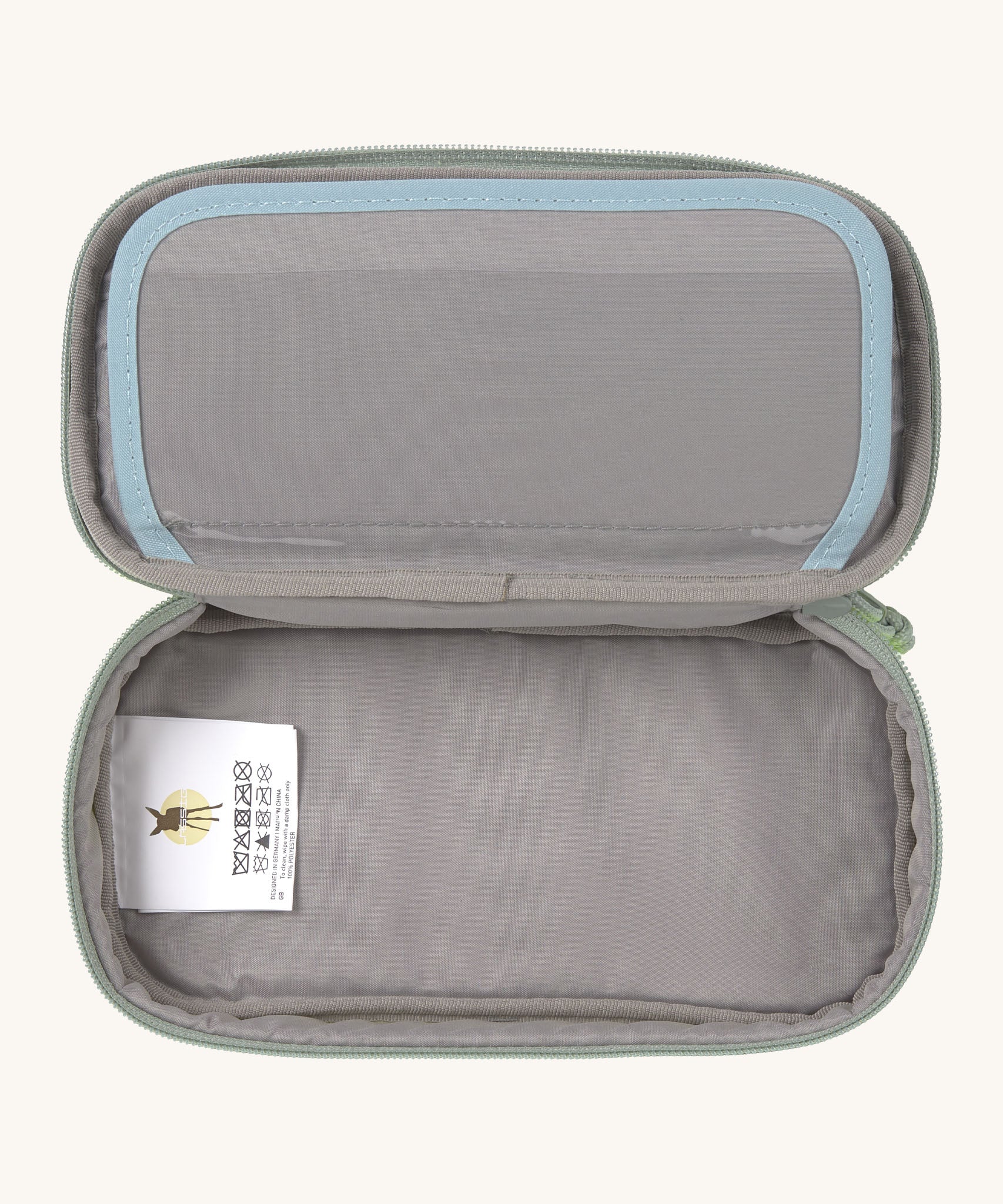 A close up of the inside of the Lassig spacy neon yellow pencil case showing the spacious compartment to hold different stationary 
