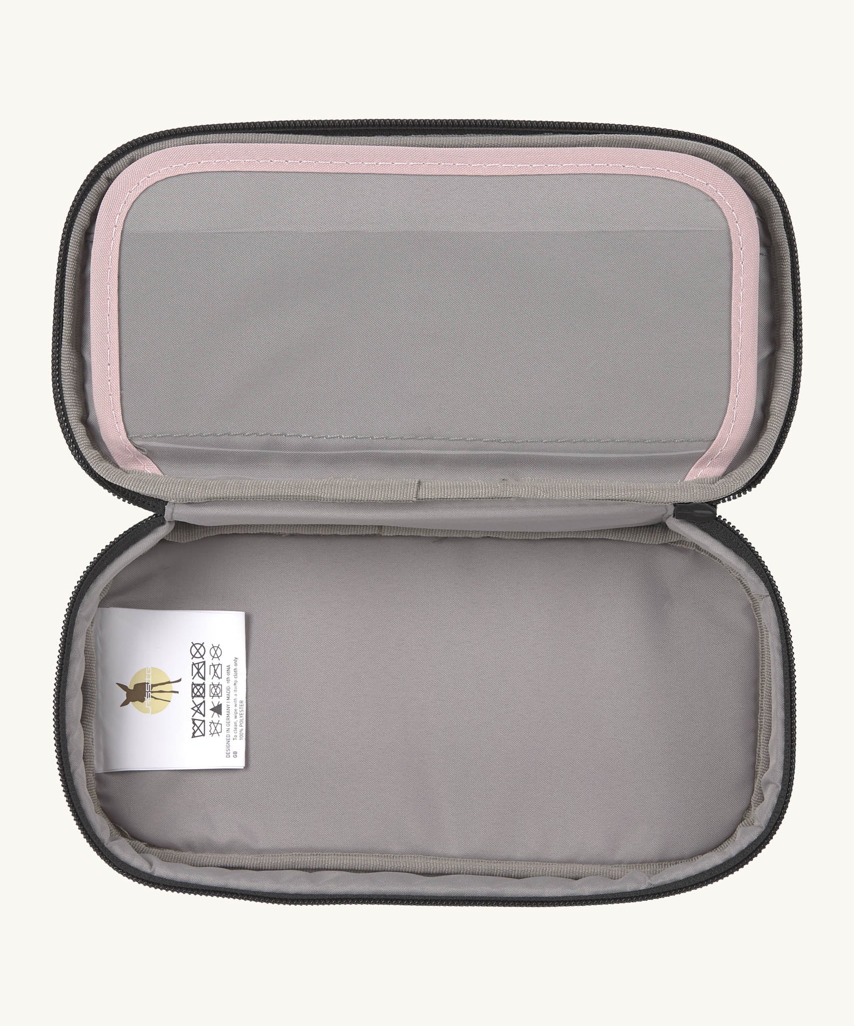 A close up of the inside of the Lassig spacy pink & navy pencil case showing the spacious compartment to hold different stationary 