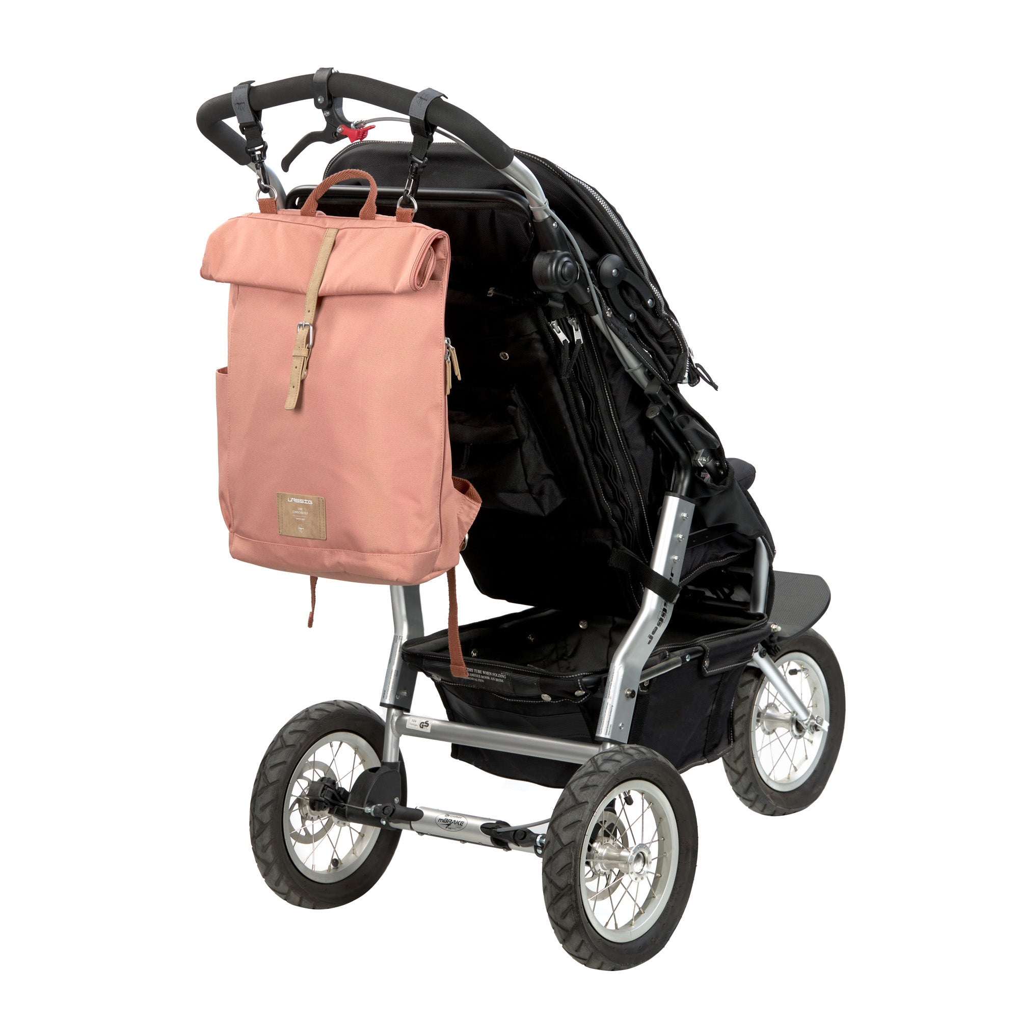 The Lassig rolltop nappy change backpack in cinnamon, attached to a pram with the included hooks
