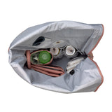 The inside of the Lassig rolltop nappy change backpack in cinnamon