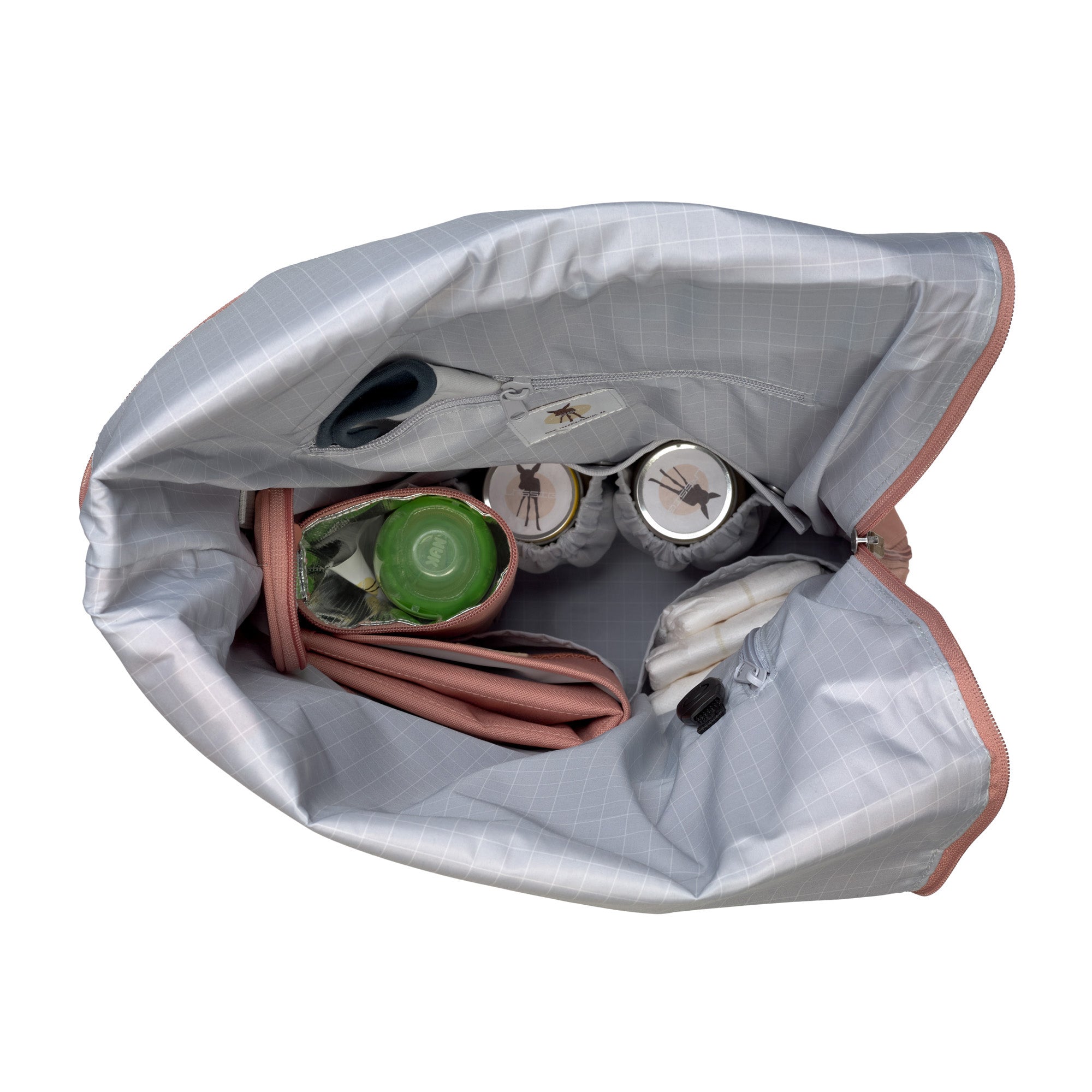 The inside of the Lassig rolltop nappy change backpack in cinnamon