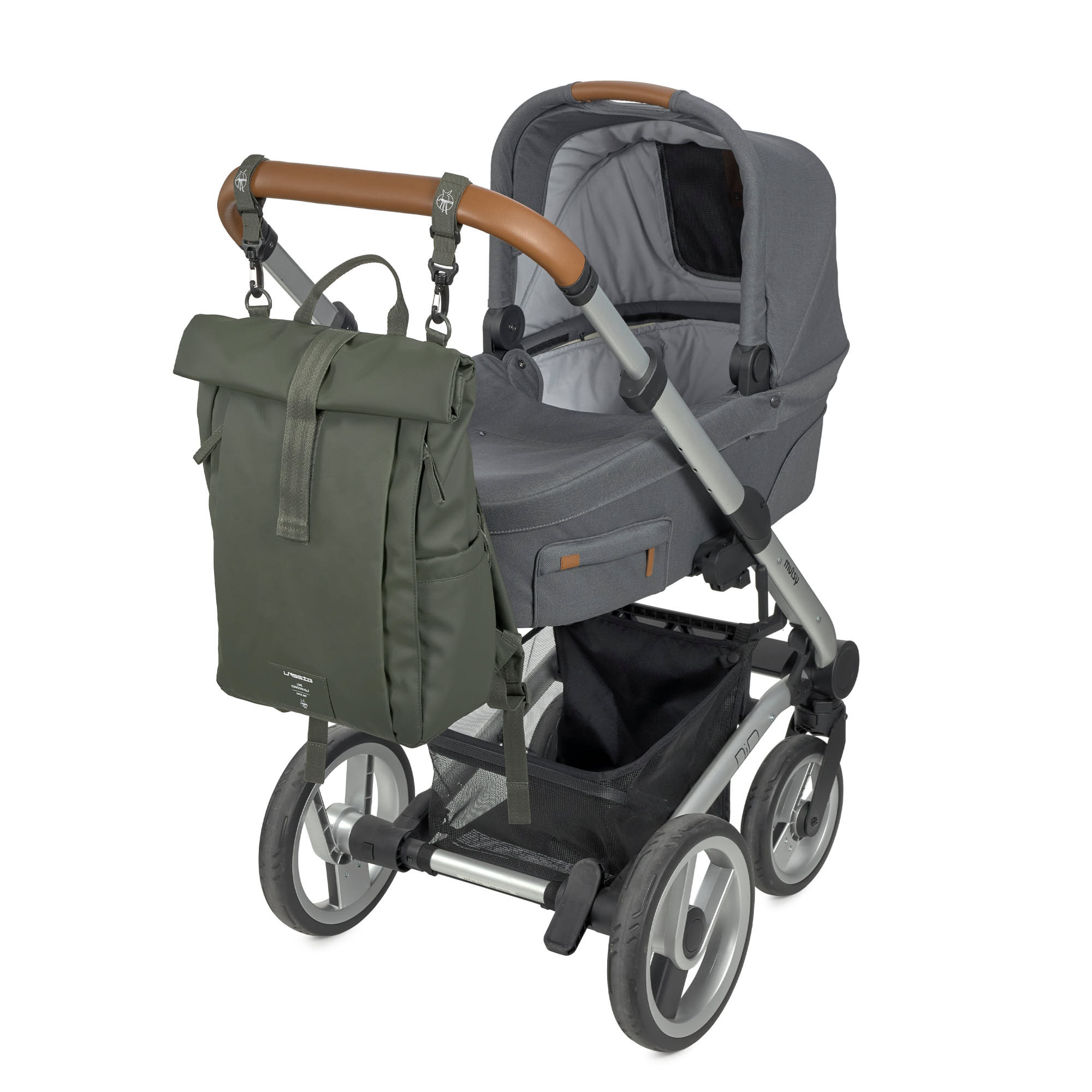 The Lassig Rolltop Up nappy change backpack in olive green, attached to a pram with the included clips.