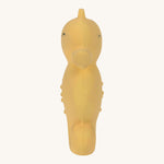 Front view of the Lassig natural rubber bath toy, a yellow seahorse.