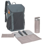 The Lassig Slender Up nappy change backpack in reflective anthracite, with the included baby change mat, insulated bottle holder, pram clips, and pouch.