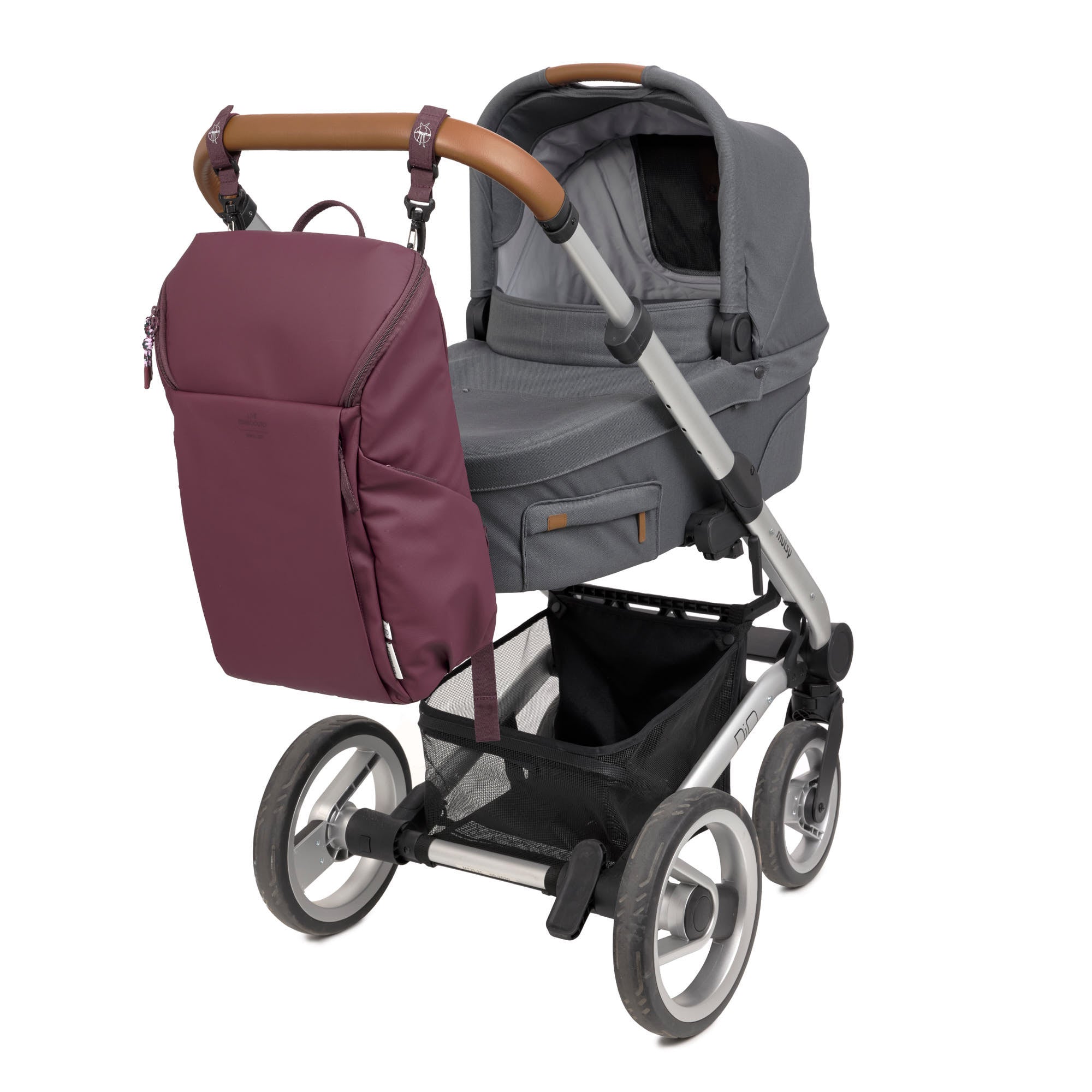 The Lassig Slender Up Nappy change backpack in deep red, attached to a pram with the included pram clips.