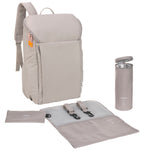 The Lassig Slender Up nappy change backpack in Taupe, with the included nappy change bag, pram clips, insulated bottle holder, and accessory pouch.