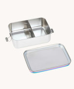 Lassig Stainless Steel Lunchbox in a  Solid Bold Rainbow design. A stainless steel lunchbox with removable divider featuring an iridescent rainbow coloured lid. This lunchbox is part of a wide range of reusable items available at Babipur. 