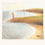 beach scene play cloth with coastline and a lighthouse