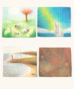 laura's play cotton seasonal set,  different play cloths laid out with artwork representing spring, summer autumn and winter