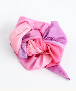 Laura's play cotton pink and purple gradient playcloth, made from 100% organic cotton ruffled up into a pile