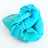 Laura's play cotton blue gradient playcloth, made from 100% organic cotton ruffled up into a pile