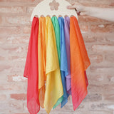 Laura's Play Cotton large Wooden Display holder with flower cut out with 7 play cloths inside.