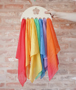 Laura's Play Cotton large Wooden Display holder with flower cut out with 7 play cloths inside.