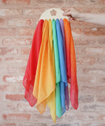 Laura's Play Cotton small Wooden Display holder with flower cut out with 7 play cloths inside.