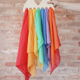 Laura's Play Cotton large Wooden Display holder with heart cut out with 7 play cloths inside.
