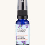 Lavender Sleep Pillow Mist pure essential oil in a blue glass bottle with a spray cap.