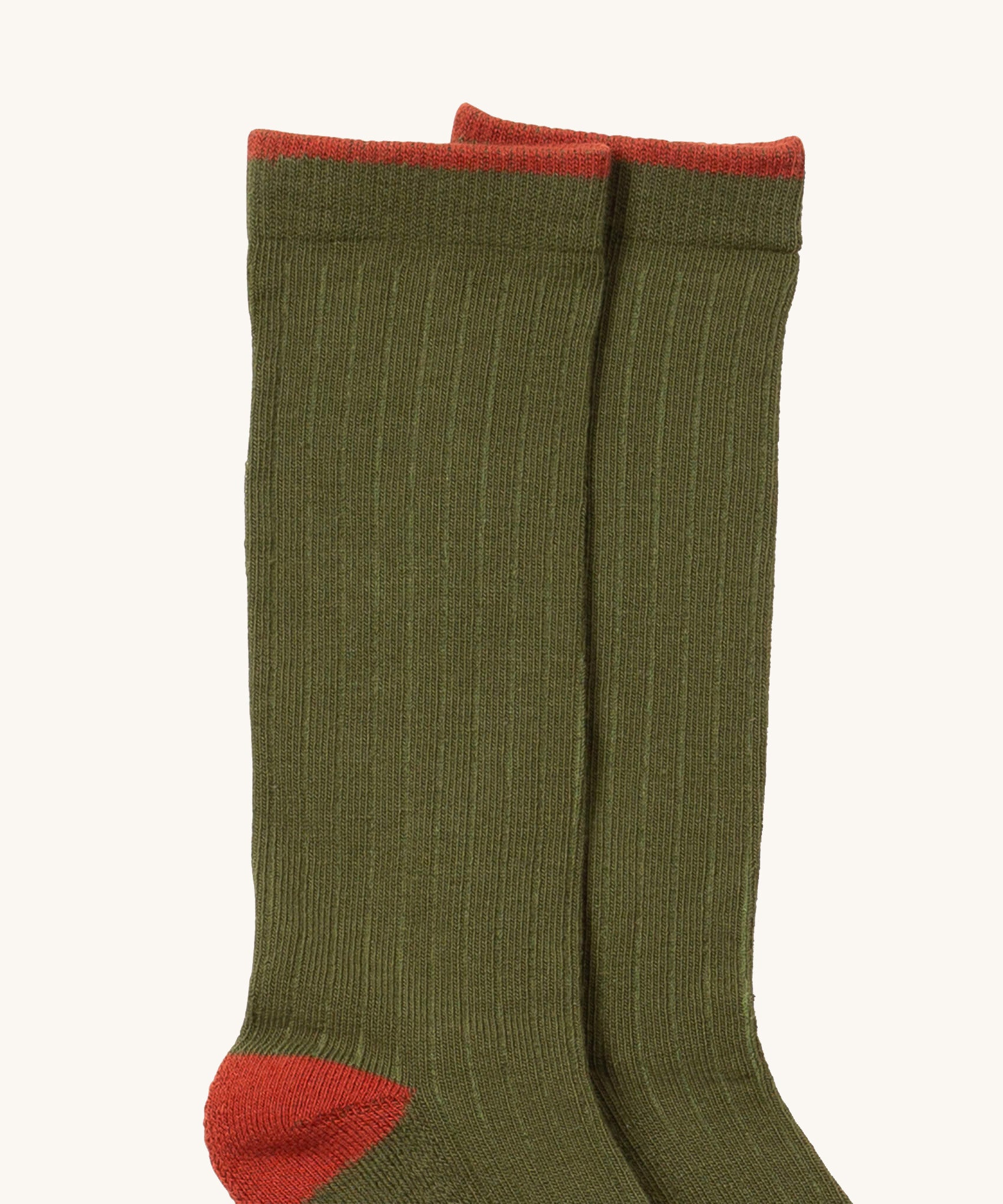 A close up of the green coloured Little Green Radicals ankle sock. Showing the soft ribbed stitch and ted trim on organic cotton fabric.