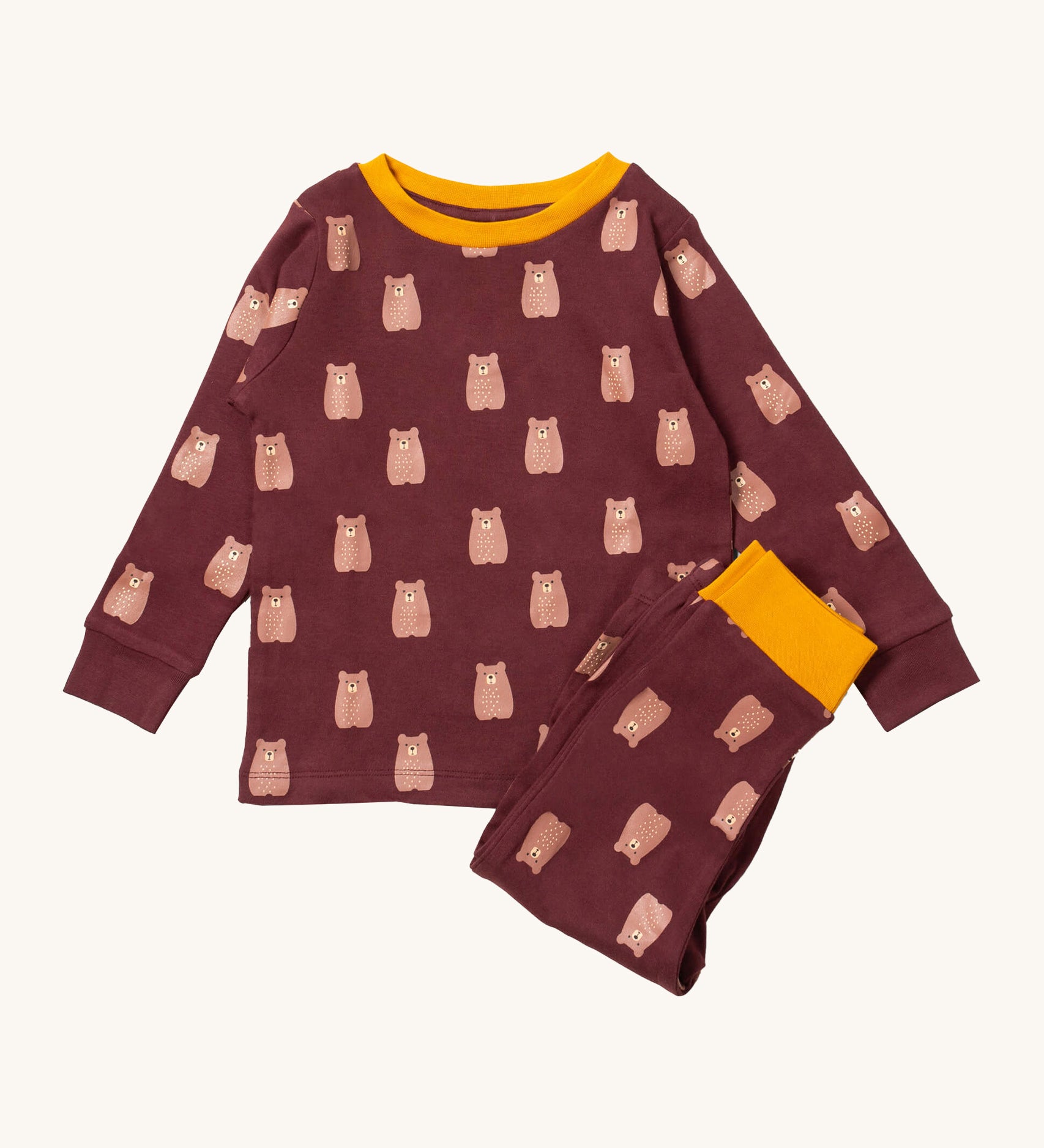 Little Green Radicals brown bear pyjama set available at Babipur.. A GOTS organic cotton pyjama top and bottom set in brown with yellow trim and cute brown bear prints.