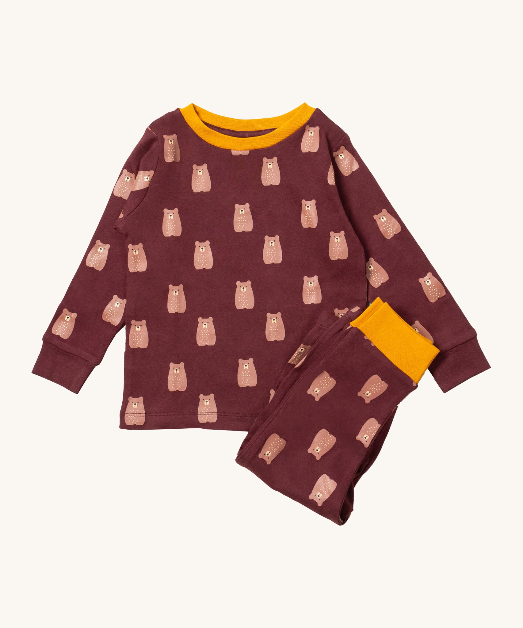 Little Green Radicals brown bear pyjama set available at Babipur.. A GOTS organic cotton pyjama top and bottom set in brown with yellow trim and cute brown bear prints.