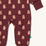 A close up of the Little Green Radicals hooded snug suit in flying birds showing the arm and leg cuff detail 