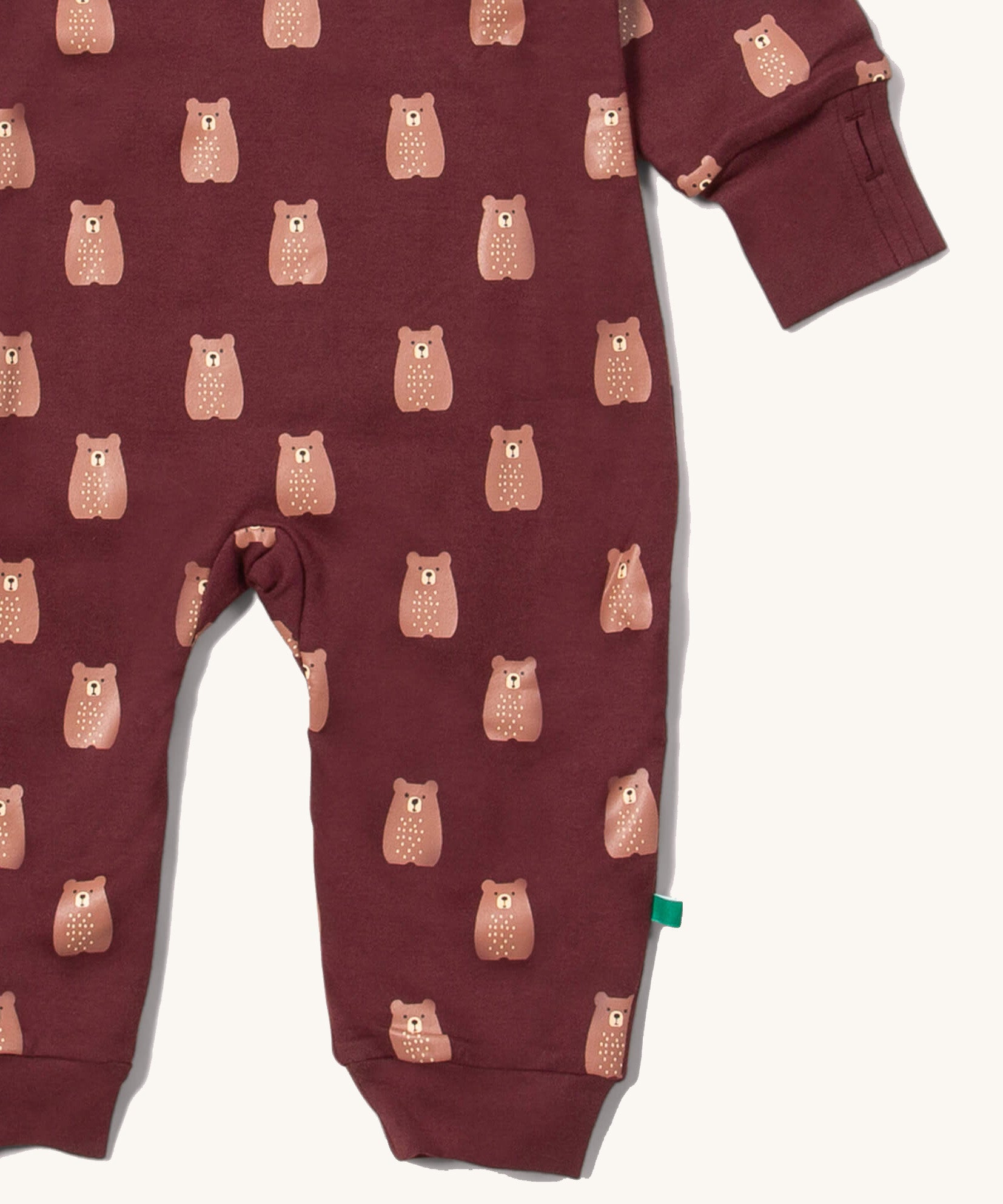 A close up of the Little Green Radicals hooded snug suit in flying birds showing the arm and leg cuff detail 