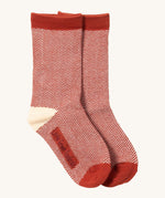 Little Green Radicals striped ankle socks available at Babipur. A red and cream GOTS organic cotton sock with a zig zag  design and red trim.