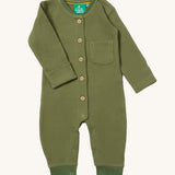 Little Green Radicals green chive waffle playsuit available at Babipur. A GOTS organic cotton all in one in a soft waffle knit style. Features button fasteners on the front and poppers around the crotch with a small pouch chest pocket and matching green trim