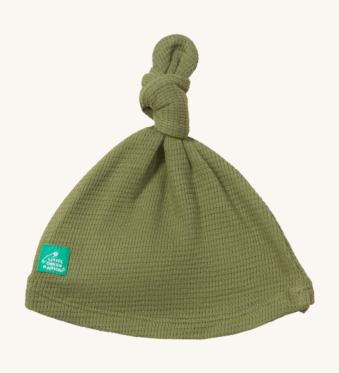 Little Green Radicals chive tie hat available at Babipur. A GOTS organic cotton hat in green with a knot on the top. Features a small brand patch on the brim