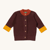 Little Green Radicals knitted cardigan in chocolate available at Babipur. A GOTS organic cotton cardigan in brown with yellow and light brown trim. Features button fasteners for a secure fit