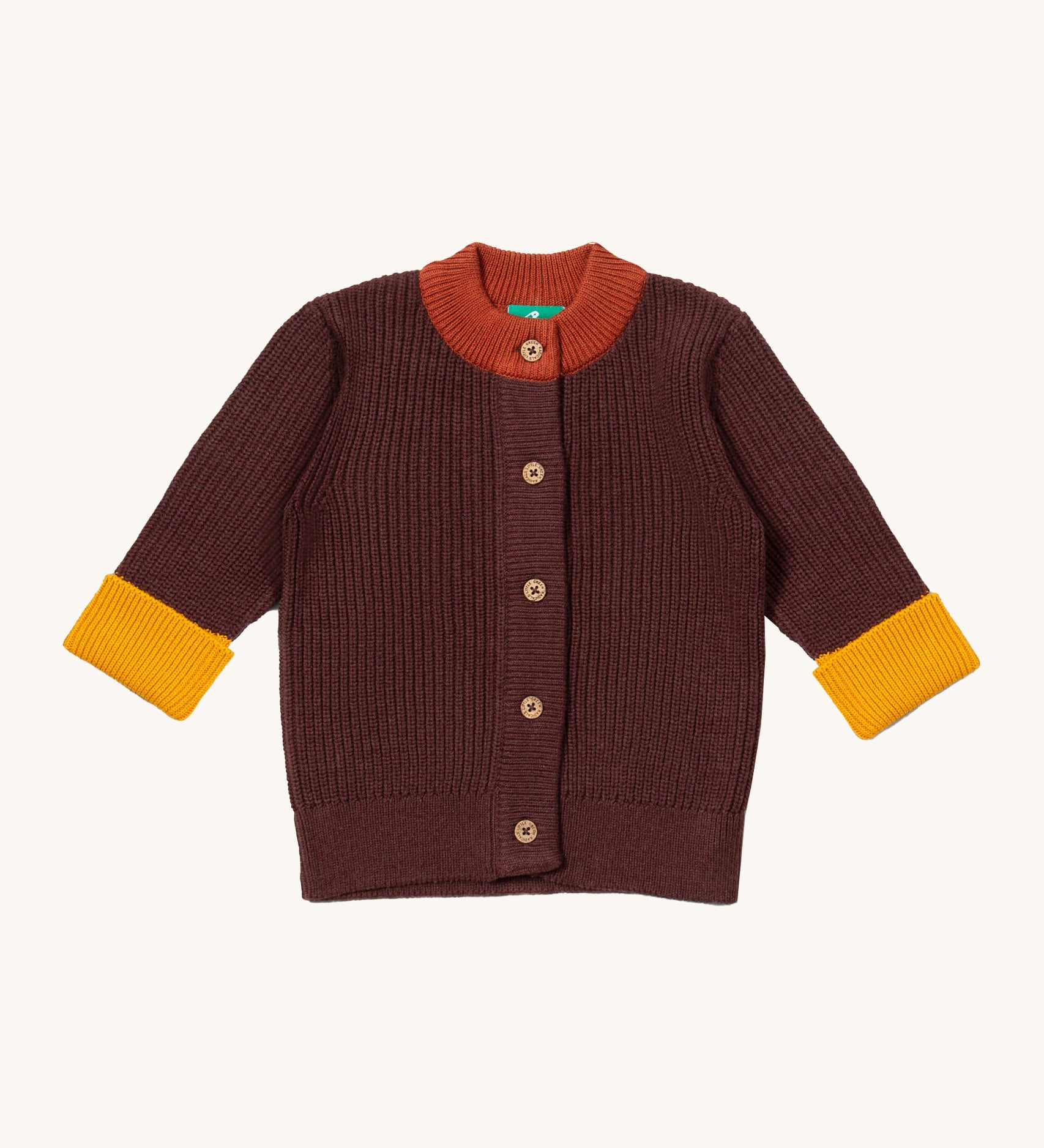 Little Green Radicals knitted cardigan in chocolate available at Babipur. A GOTS organic cotton cardigan in brown with yellow and light brown trim. Features button fasteners for a secure fit