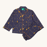 Little Green Radicals classic pyjama set in dark night available at Babipur. A GOTS organic cotton pyjama set including a long sleeve shirt style top in navy with yellow trim and a starry night print and matching navy bottoms.