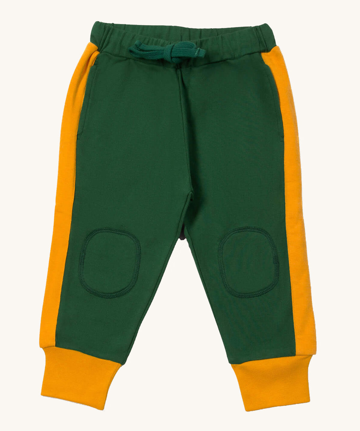Little Green Radicals cosy joggers in olive available at Babipur.. A soft GOTS organic cotton green jogger pants with a yellow stripe on the side and matching yellow trim. Features 2 side pockets a matching green waist drawstring and knee patches.