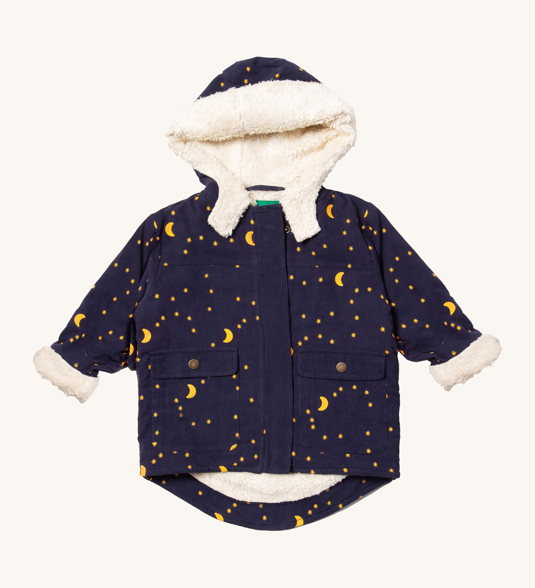 Little Green Radicals dark night sherpa toasty coat available at  Babipur. A GOTS organic cotton winter corduroy style jacket  in navy with a white fleece inner for warmth. Features 2 side pockets with popper fasteners and a delicate starry night design