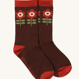 Little Green Radicals flowers ankle socks available at Babipur. A brown GOTS organic cotton sock with a retro flower design and red trim.
