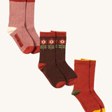 Little Green Radicals flowers ankle sock multipack set available at Babipur. A set of 3 GOTS organic cotton ankle socks including a red and white stripe sock, a brown sock with retro flowers and a red sock.