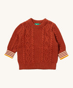 Little Green Radicals ginger aran knitted jumper available at Babipur. A GOTS organic cotton jumper in dark orange with a thick cable knit on the body and a striped design on the cuffs.