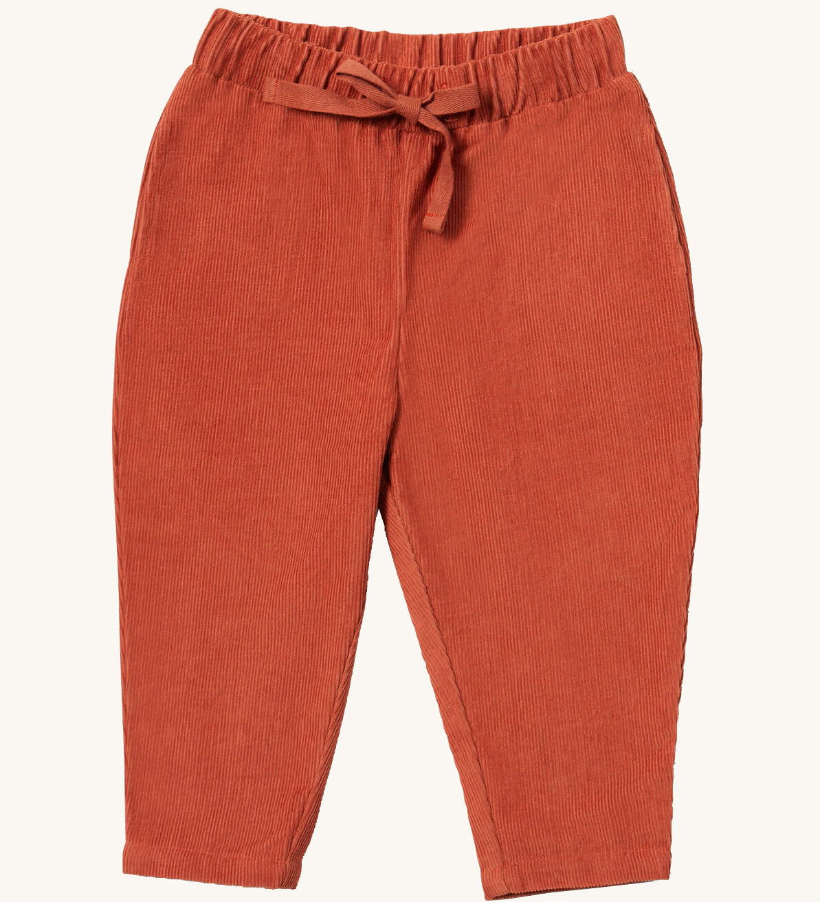Little Green Radicals comfy trousers in ginger corduroy available at Babipur. A soft GOTS organic cotton trousers in dark orange with elasticated waistband for a comfortable fit and a matching drawstring.