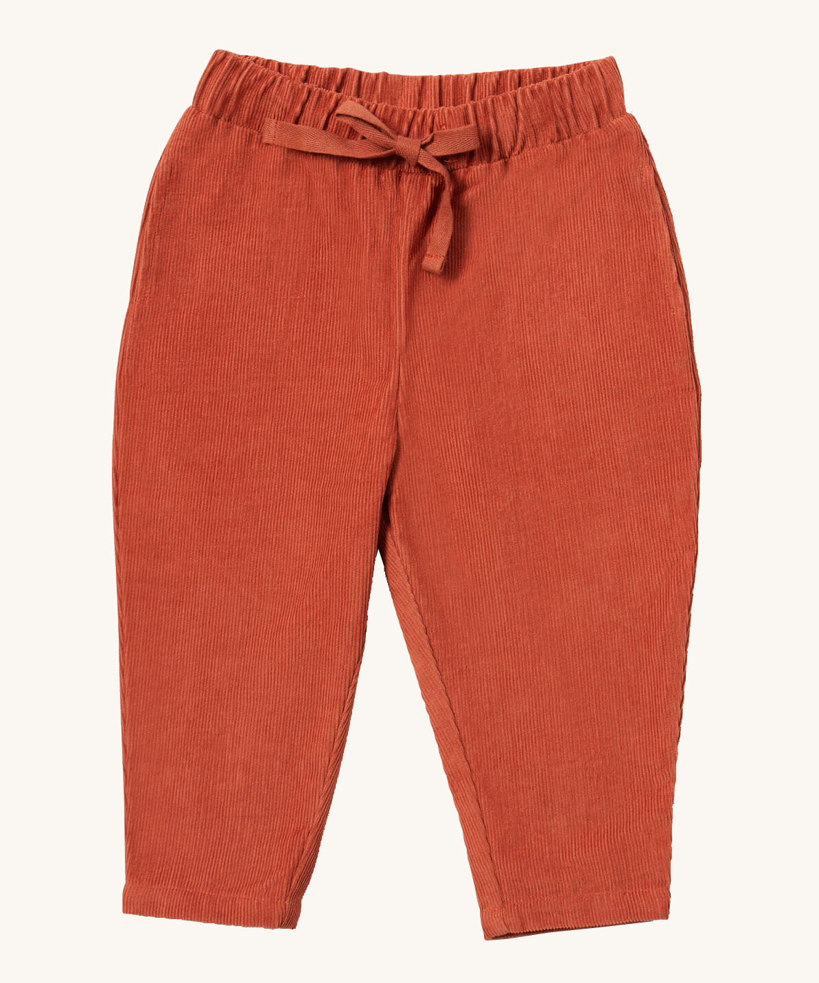 Little Green Radicals comfy trousers in ginger corduroy available at Babipur. A soft GOTS organic cotton trousers in dark orange with elasticated waistband for a comfortable fit and a matching drawstring.