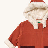 A close up of the Little Green Radicals ginger sherpa toasty coat available at Babipur. Showing the white sherpa style fleece under the hood, the cuff for warmth and corduroy detail on GOTS organic cotton fabric. 
