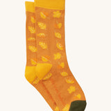 Little Green Radicals golden leaves ankle socks available at Babipur. A GOTS organic cotton sock with a autumn inspired leaves design and a green toe trim