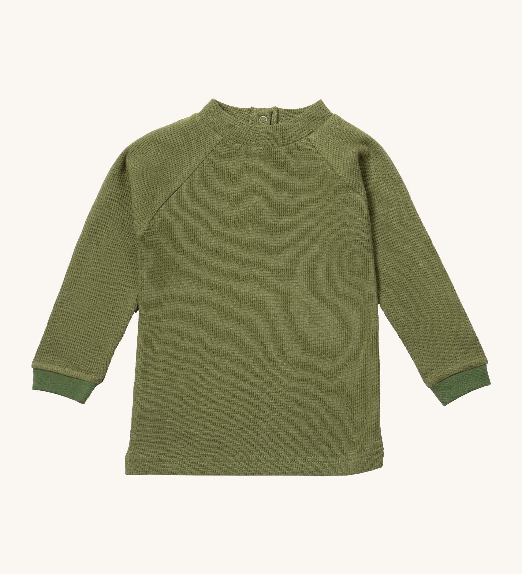 Little Green Radicals green chive waffle long sleeve cosy top available at Babipur. A GOTS organic cotton top in dark green, features popper fasteners on the back
